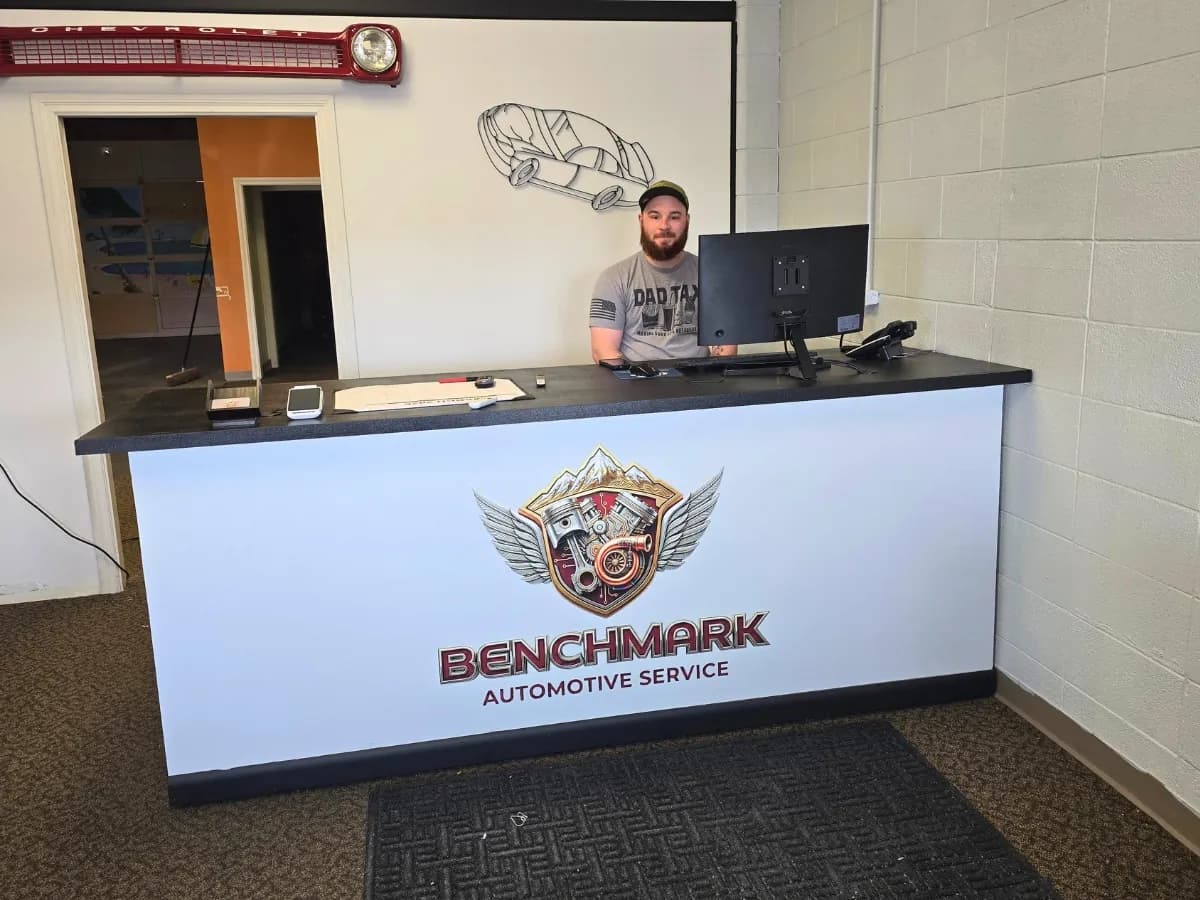 Front counter and team member inside Benchmark Automotive Service in Missoula